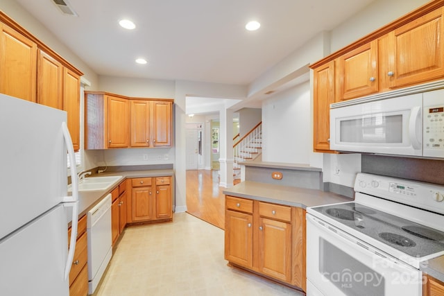 2065 Gable Way Ln, Matthews, NC 28104 - kitchen with white appliances, recessed lighting, light countertops, and light flooring