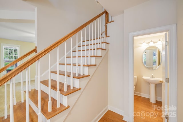 2065 Gable Way Ln, Matthews, NC 28104 - staircase with wood finished floors and baseboards