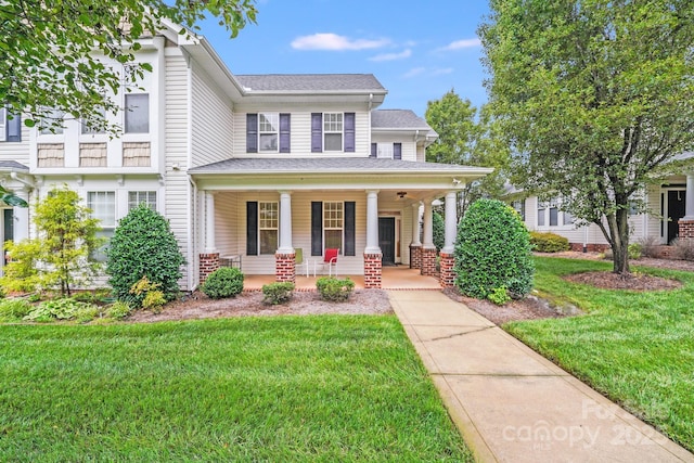 2065 Gable Way Ln, Matthews, NC 28104 - view of front facade with a front lawn and a porch