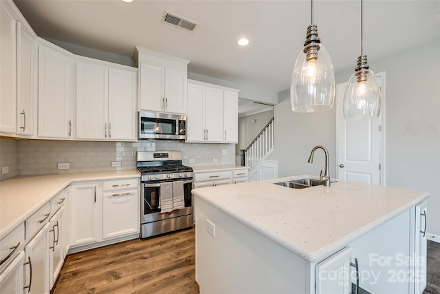 173 Morgans Branch Rd, Belmont, NC 28012 - kitchen with appliances with stainless steel finishes, a sink, dark wood finished floors, recessed lighting, and backsplash