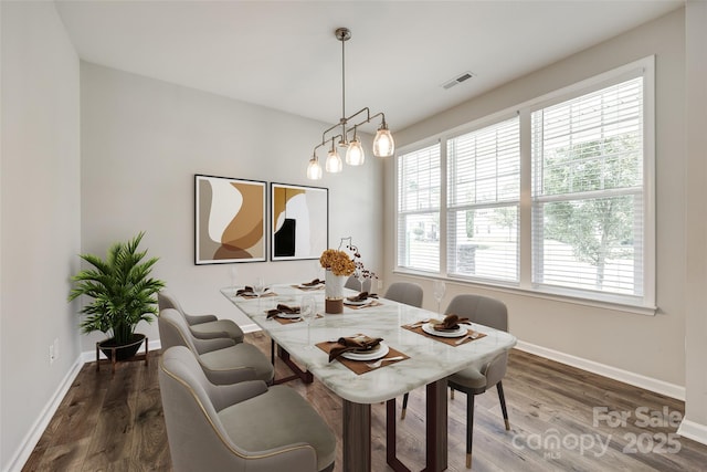 173 Morgans Branch Rd, Belmont, NC 28012 - dining space featuring healthy amount of natural light, wood finished floors, and baseboards