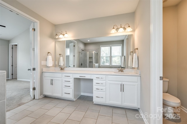 173 Morgans Branch Rd, Belmont, NC 28012 - bathroom featuring double vanity, a shower stall, toilet, tile patterned flooring, and baseboards