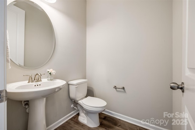 173 Morgans Branch Rd, Belmont, NC 28012 - half bath featuring wood finished floors, baseboards, and toilet