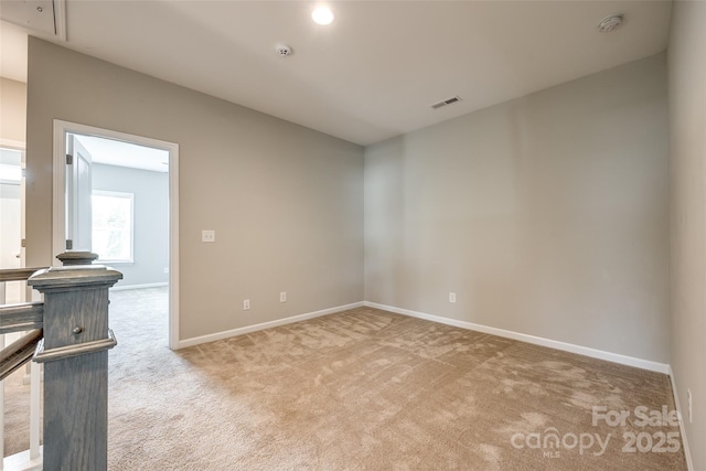 173 Morgans Branch Rd, Belmont, NC 28012 - spare room featuring light carpet, baseboards, and a smoke detector