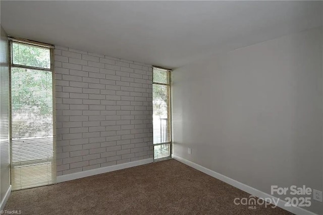 1807 S Hawthorne Rd, Winston Salem, NC 27103 - unfurnished room featuring dark carpet and baseboards