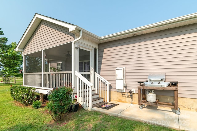 2737 Bobcat Rd, Heath Springs, SC 29058 - back of house with a sunroom and a lawn