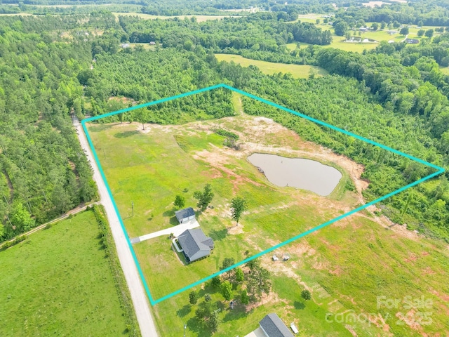 2737 Bobcat Rd, Heath Springs, SC 29058 - view of property location with a large body of water, property parcel outlined, and a heavily wooded area