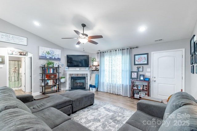 2737 Bobcat Rd, Heath Springs, SC 29058 - living room featuring a ceiling fan, wood finished floors, a brick fireplace, vaulted ceiling, and recessed lighting