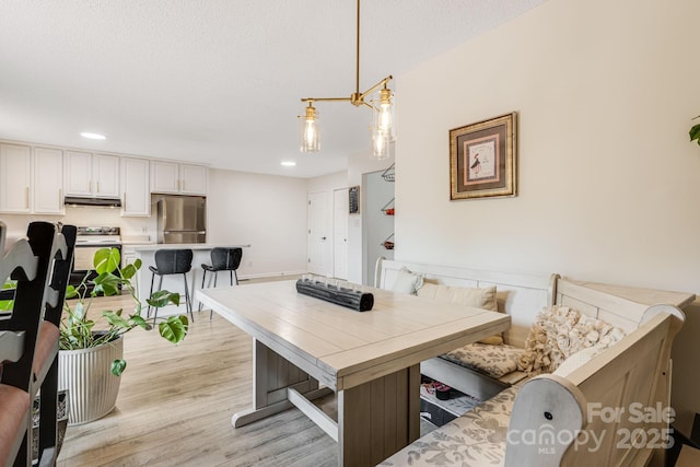 101 Michael Ct, Leicester, NC 28748 - dining space with light wood-style floors and recessed lighting