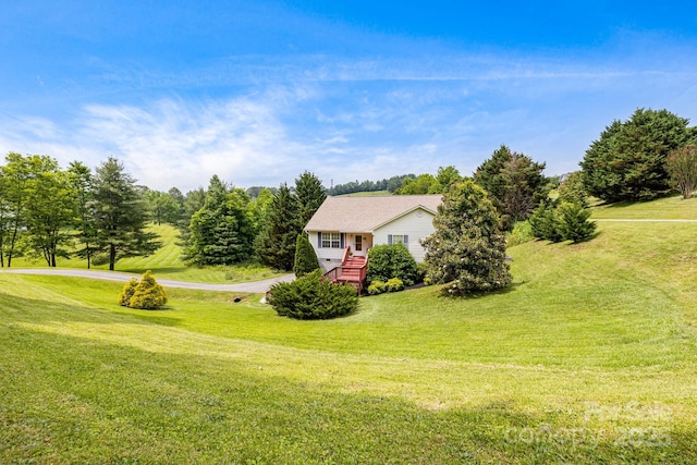 101 Michael Ct, Leicester, NC 28748 - view of property exterior featuring a lawn and view of scattered trees