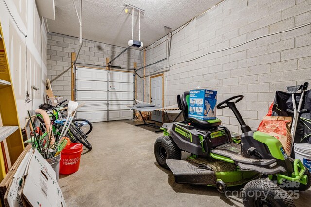 101 Michael Ct, Leicester, NC 28748 - garage featuring a garage door opener