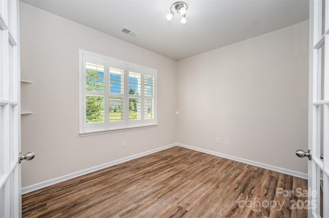 150 Haddonsfield Dr, Mooresville, NC 28115 - spare room with wood finished floors and baseboards