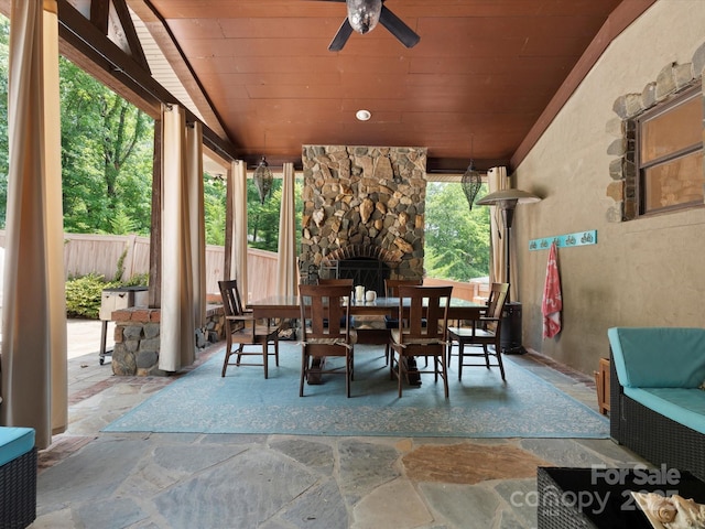 315 Mountainview Dr, Charlotte, NC 28270 - view of patio with an outdoor stone fireplace, outdoor dining area, and a ceiling fan
