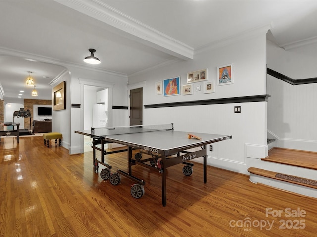 315 Mountainview Dr, Charlotte, NC 28270 - game room featuring crown molding, wood finished floors, and baseboards