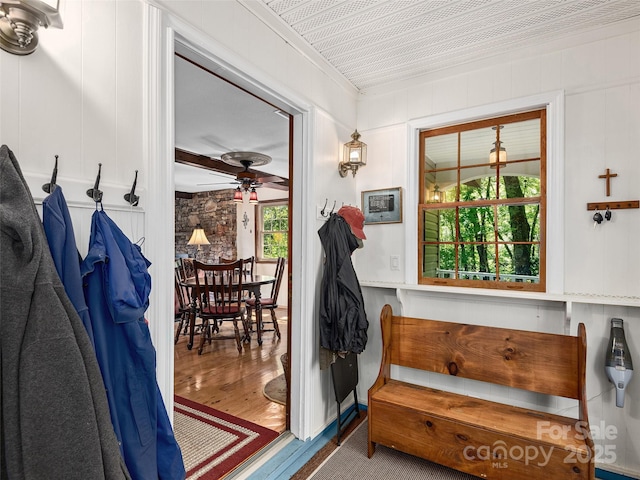 573 Valeria Ln, Pisgah Forest, NC 28768 - entryway featuring wood finished floors, a ceiling fan, and crown molding