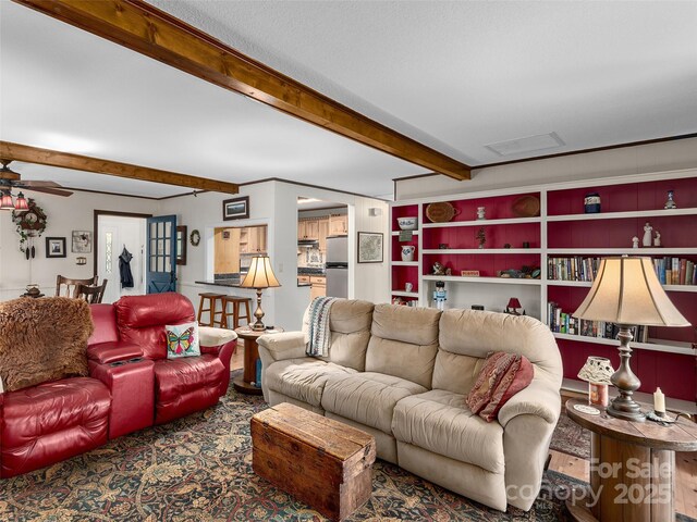573 Valeria Ln, Pisgah Forest, NC 28768 - living area featuring beamed ceiling and ceiling fan