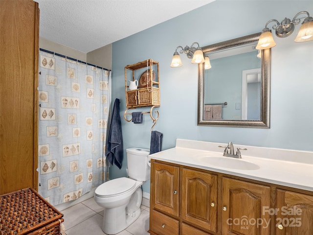 573 Valeria Ln, Pisgah Forest, NC 28768 - bathroom with toilet, vanity, tile patterned flooring, a textured ceiling, and a shower with shower curtain