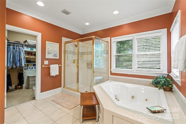 4740 Myers Ln, Harrisburg, NC 28075 - full bathroom with plenty of natural light, a stall shower, a jetted tub, a walk in closet, and crown molding