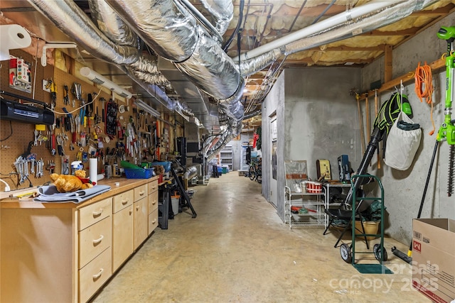 4740 Myers Ln, Harrisburg, NC 28075 - unfinished basement with a workshop area