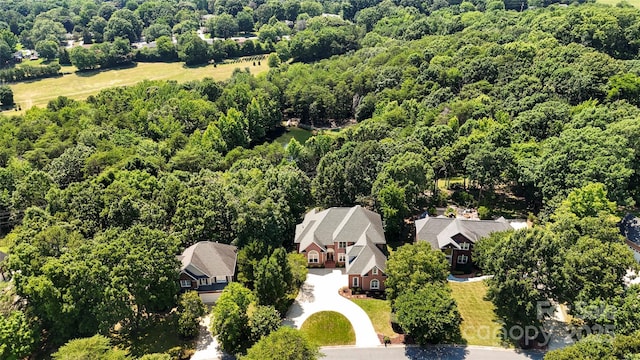 4740 Myers Ln, Harrisburg, NC 28075 - aerial perspective of suburban area featuring a heavily wooded area