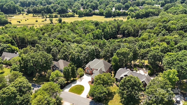 4740 Myers Ln, Harrisburg, NC 28075 - aerial perspective of suburban area featuring a forest