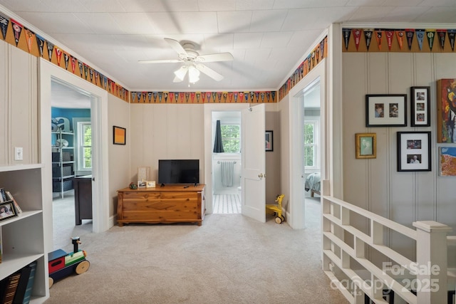 81 21st Ave NW, Hickory, NC 28601 - sitting room featuring ceiling fan, carpet flooring, and crown molding