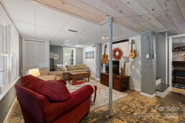 81 21st Ave NW, Hickory, NC 28601 - living area featuring baseboards and a drop ceiling