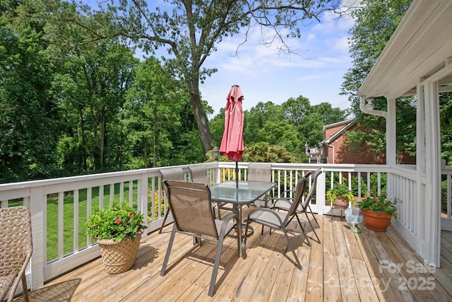 81 21st Ave NW, Hickory, NC 28601 - wooden deck with outdoor dining area