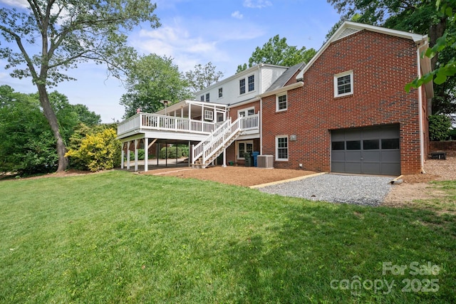 81 21st Ave NW, Hickory, NC 28601 - rear view of house featuring brick siding, stairway, a garage, a deck, and driveway