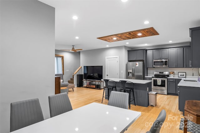 358 London Rd, Asheville, NC 28803 - dining area featuring stairway, light wood-style floors, recessed lighting, and a ceiling fan