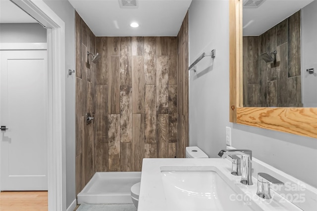 358 London Rd, Asheville, NC 28803 - bathroom featuring toilet, a shower stall, a sink, and recessed lighting