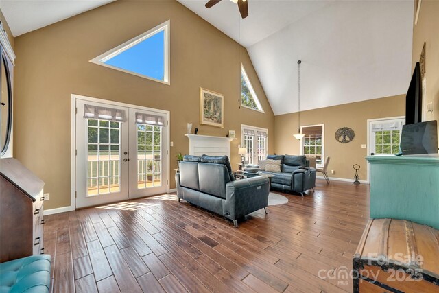 186 Hawks Point Dr, Zirconia, NC 28790 - living area featuring high vaulted ceiling, a ceiling fan, french doors, wood finished floors, and baseboards