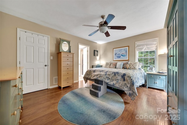 186 Hawks Point Dr, Zirconia, NC 28790 - bedroom featuring wood finished floors and a ceiling fan