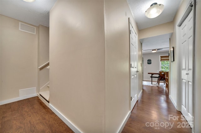 186 Hawks Point Dr, Zirconia, NC 28790 - corridor with dark wood-type flooring and a textured ceiling