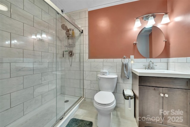 186 Hawks Point Dr, Zirconia, NC 28790 - bathroom featuring tile walls, a stall shower, vanity, and tile patterned flooring