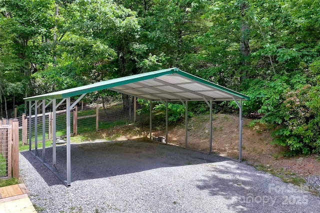 186 Hawks Point Dr, Zirconia, NC 28790 - view of car parking featuring a detached carport and gravel driveway
