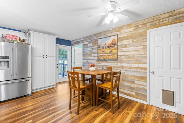 106 Laren Rd, Shelby, NC 28152 - dining area featuring a textured ceiling, wood finished floors, and a ceiling fan