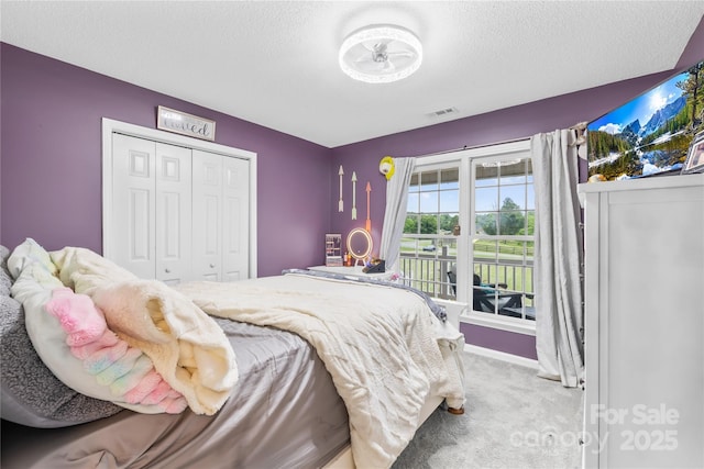 106 Laren Rd, Shelby, NC 28152 - bedroom with carpet flooring, a closet, and a textured ceiling