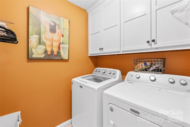 106 Laren Rd, Shelby, NC 28152 - washroom with cabinet space, washing machine and dryer, and a textured ceiling
