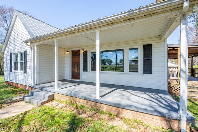 260 Penninger Dr, Woodleaf, NC 27054 - back of property with a porch and metal roof