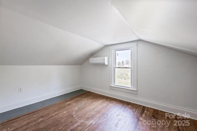 260 Penninger Dr, Woodleaf, NC 27054 - bonus room with baseboards, wood-type flooring, lofted ceiling, and an AC wall unit