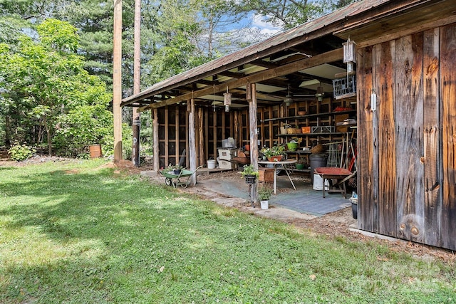 603 S Orchard Rd, Flat Rock, NC 28731 - view of green lawn with an outbuilding