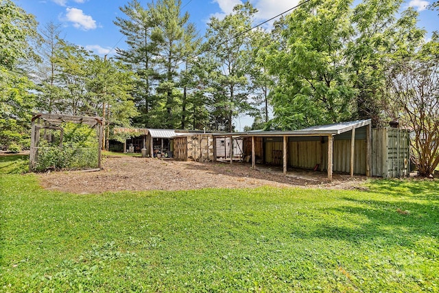 603 S Orchard Rd, Flat Rock, NC 28731 - view of grassy yard with an outbuilding
