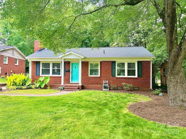4906 Charleston Dr, Charlotte, NC 28212 - view of front of property with brick siding, a front lawn, crawl space, and roof with shingles