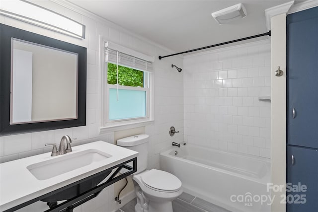 4906 Charleston Dr, Charlotte, NC 28212 - full bath with bathing tub / shower combination, crown molding, vanity, and tile walls