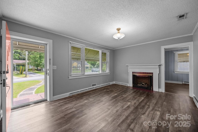 216 Hillcrest Pl, Salisbury, NC 28144 - unfurnished living room featuring crown molding, a baseboard radiator, a fireplace, a textured ceiling, and dark wood-type flooring
