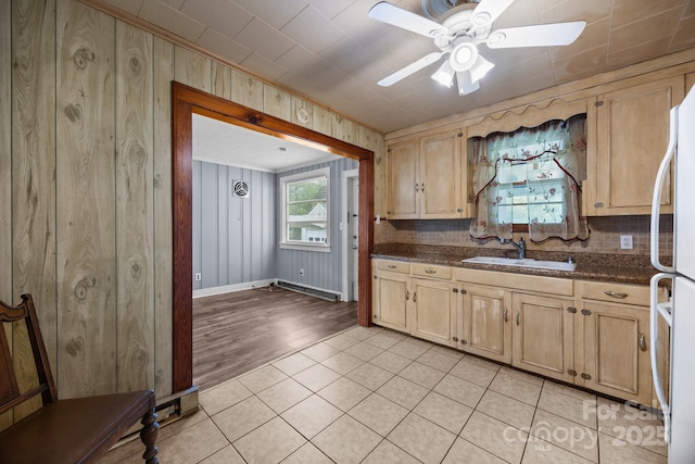 216 Hillcrest Pl, Salisbury, NC 28144 - kitchen with a sink, ceiling fan, freestanding refrigerator, light brown cabinets, and light tile patterned floors