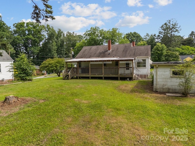 216 Hillcrest Pl, Salisbury, NC 28144 - rear view of house with a chimney, a yard, and a deck