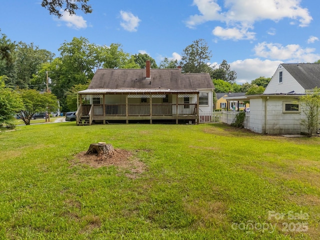 216 Hillcrest Pl, Salisbury, NC 28144 - rear view of property featuring a deck and a chimney