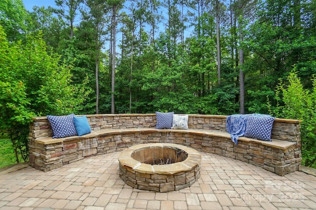 110 St Sophia Ct, Mooresville, NC 28117 - view of patio featuring an outdoor fire pit